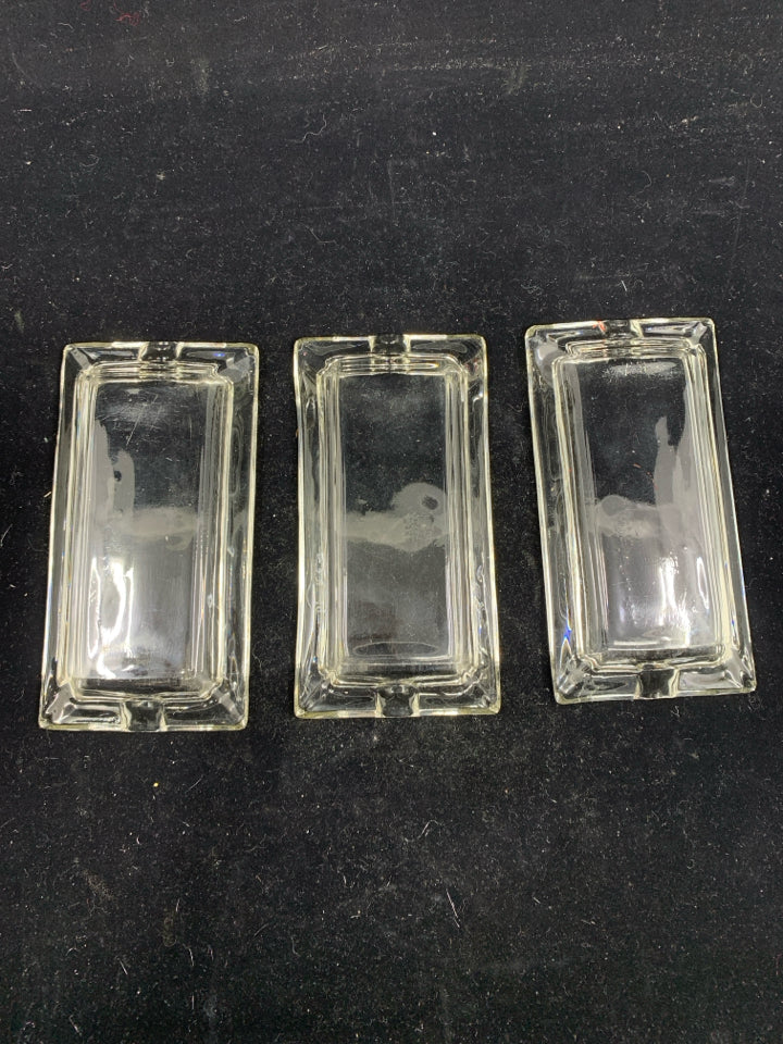 3 GLASS RECTANGLE ASH TRAYS.