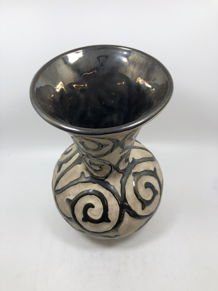 BLACK SWIRLED STONEWARE VASE.