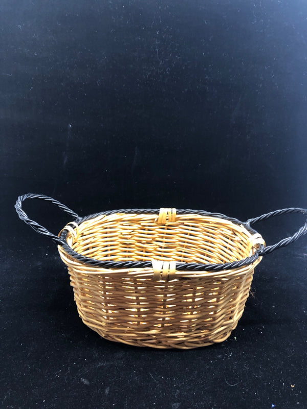 BLONDE OVAL BASKET W BLACK METAL HANDLES/RIM.