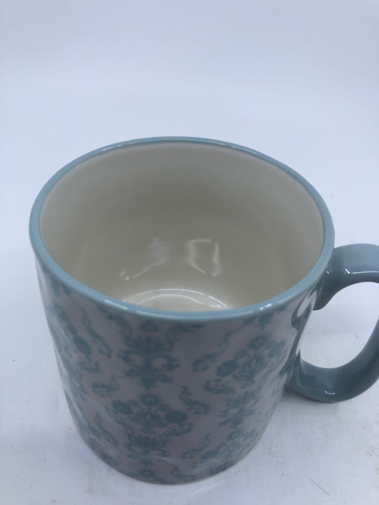 LIGHT BLUE SCROLL/FLORAL DESIGN MUG.