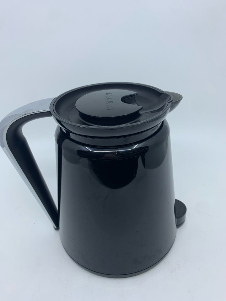 BLACK PLASTIC KEURIG CARAFFE.