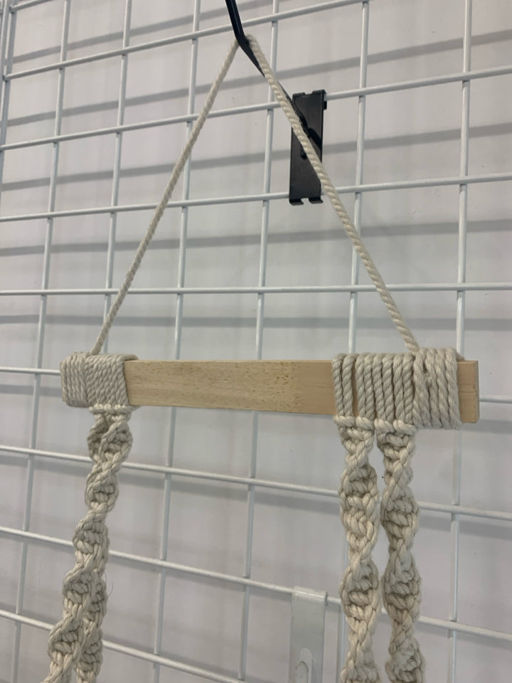 HANGING MACRAME AND WOOD SHELF.