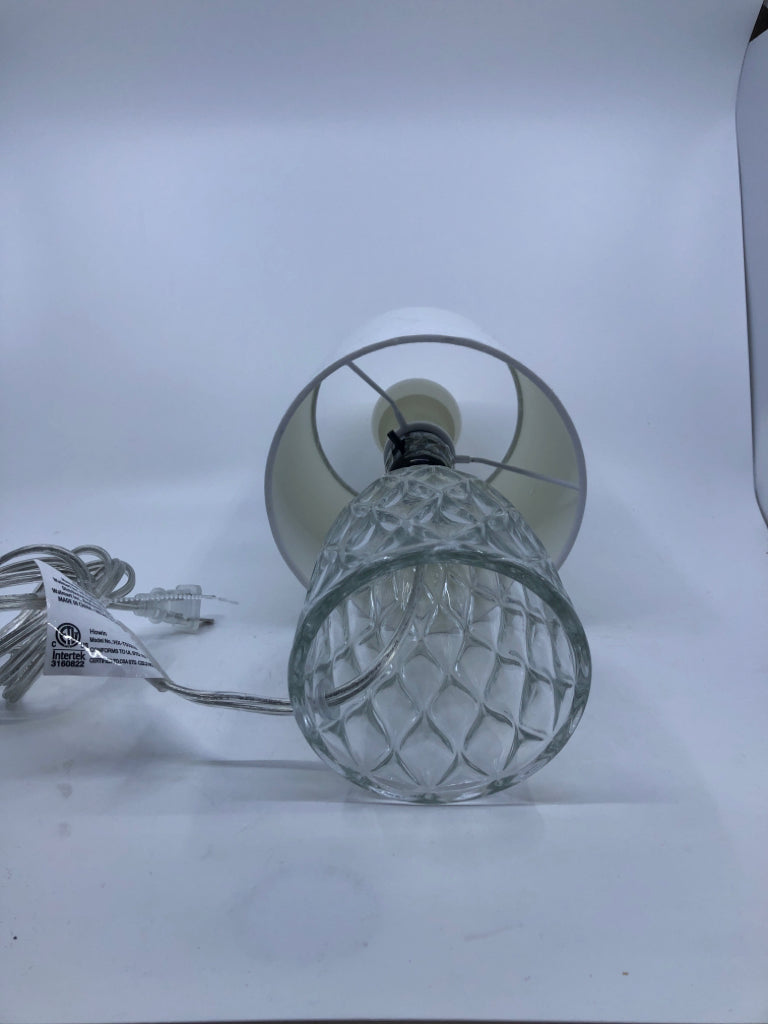 CLEAR GLASS LAMP W WHITE SHADE.