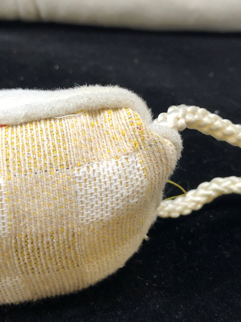 TAN  PLAID DRAFT STOPPER.