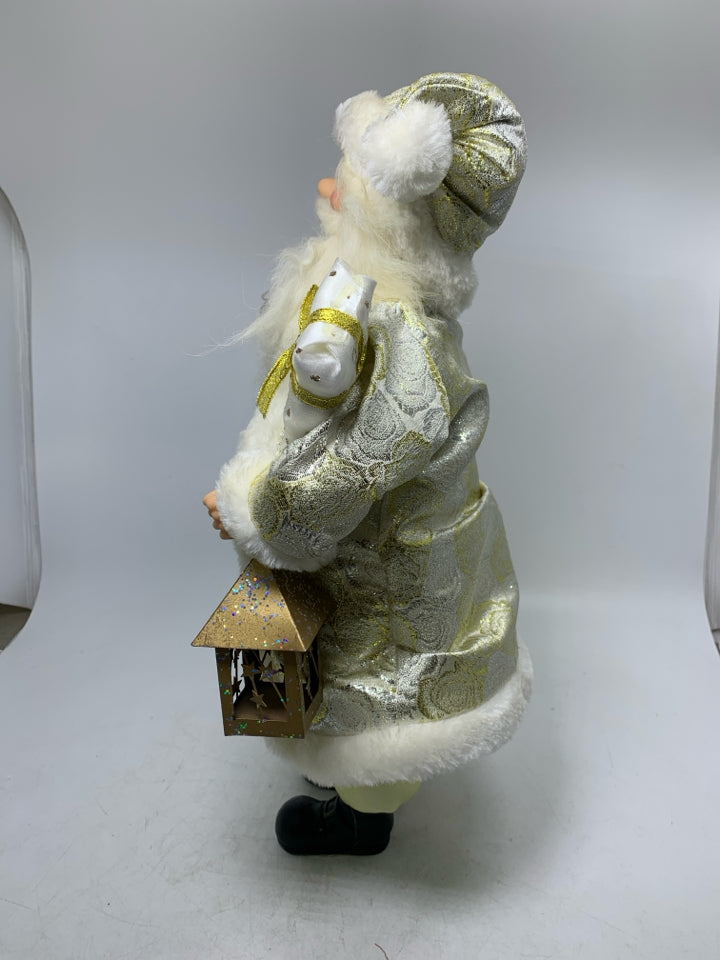 LIGHT WEIGHT SANTA DRESSED IN GOLD SUIT HOLDING PRESENTS/LANTERN.