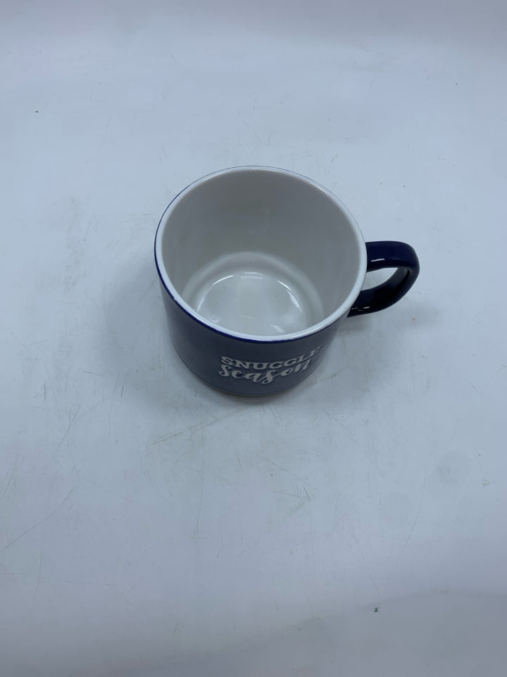 SNUGGLE SEASON BLUE CERAMIC MUG.