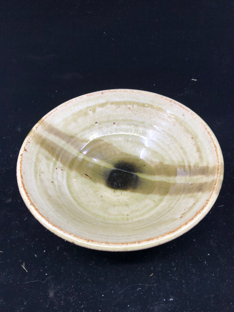 GREEN TINTED GLASS BOWL W BLACK/DARK CENTER.