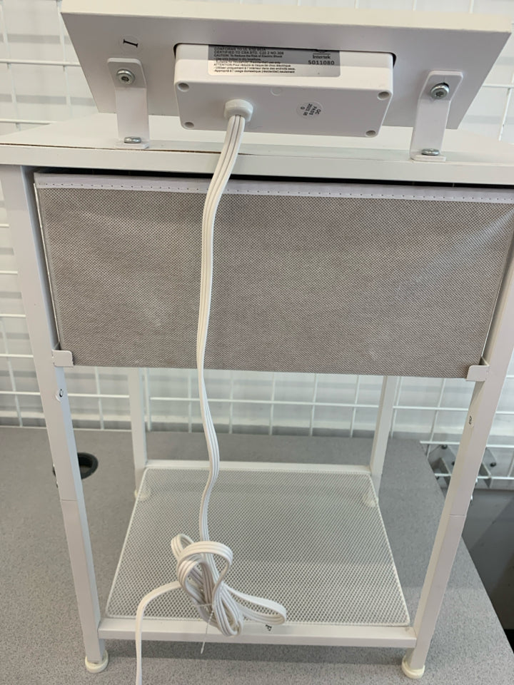 WHITE METAL FRAME NIGHTSTAND W/FABRIC DRAWER POWER OUTLET.