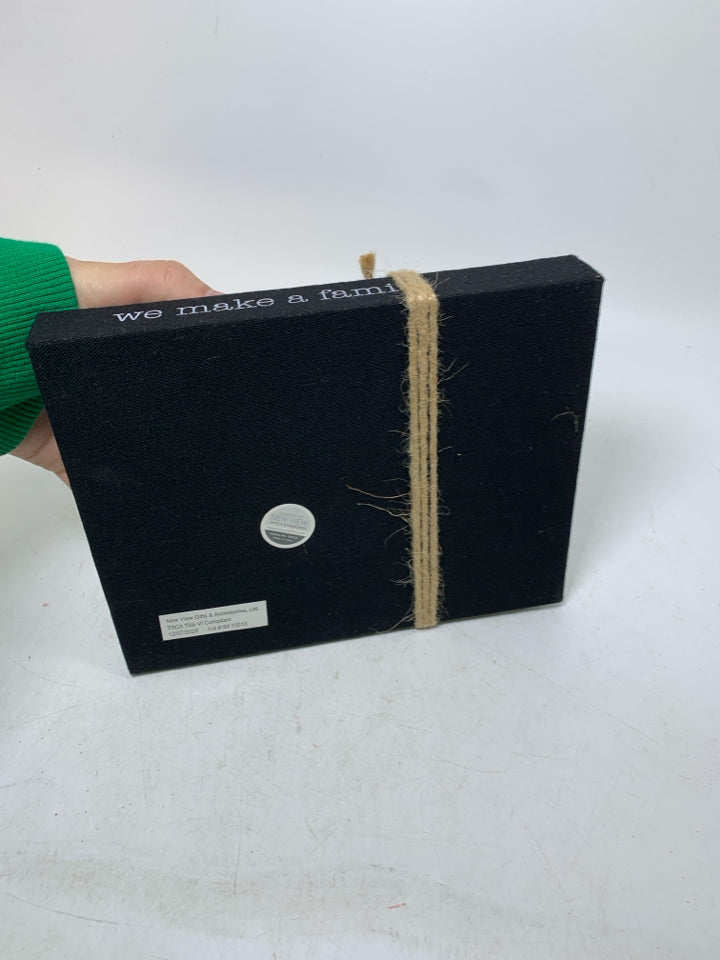 BLACK DOUBLE STACK BOOKS W/ SCRIPT.