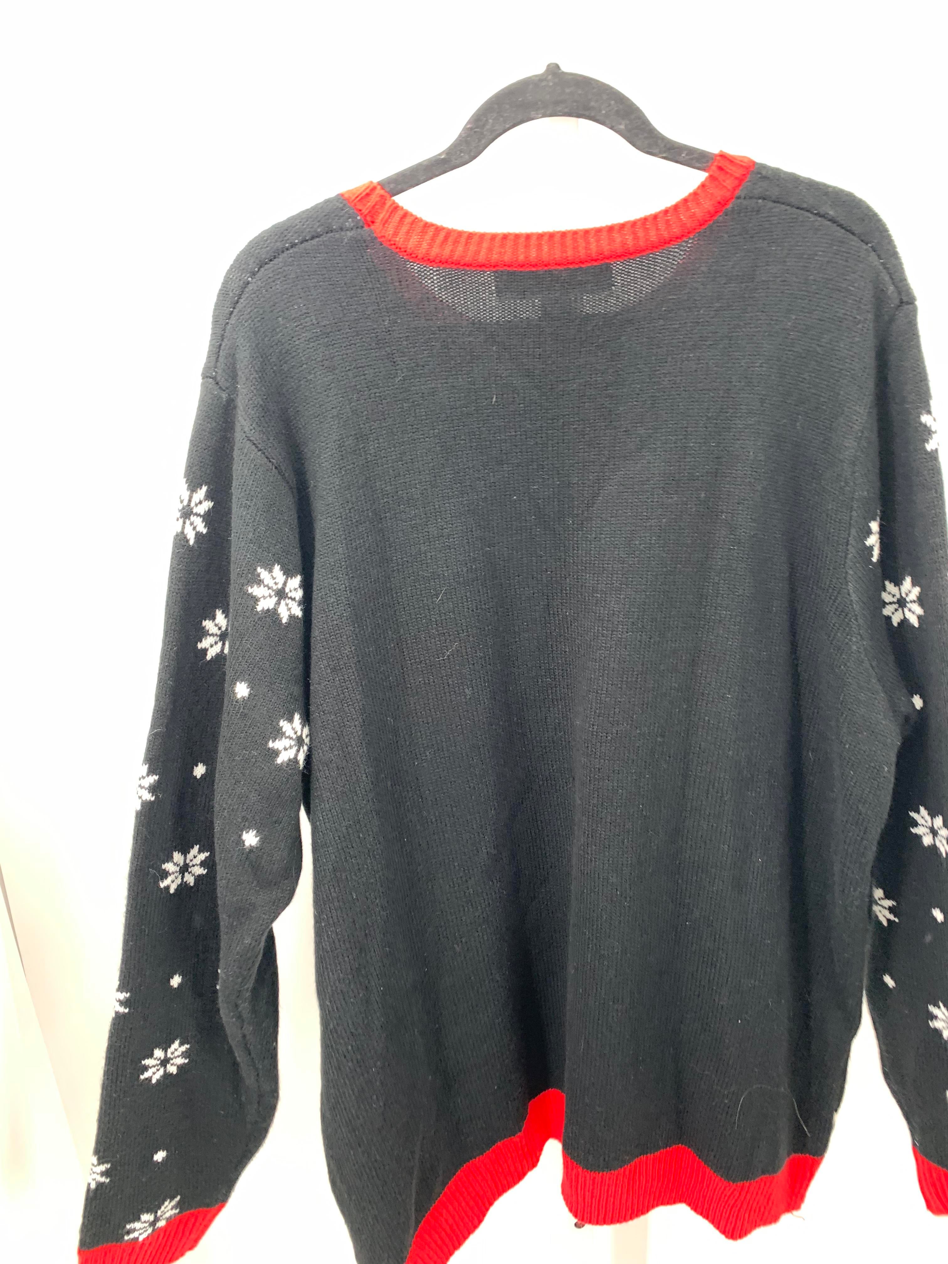 LONG SLV SWEATER SATAN AND REINDEER.