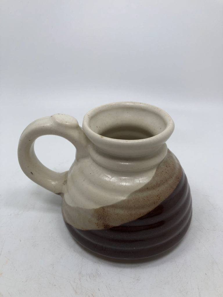 BROWN/CREAM GLAZED NON SLIP POTTERY MUG.