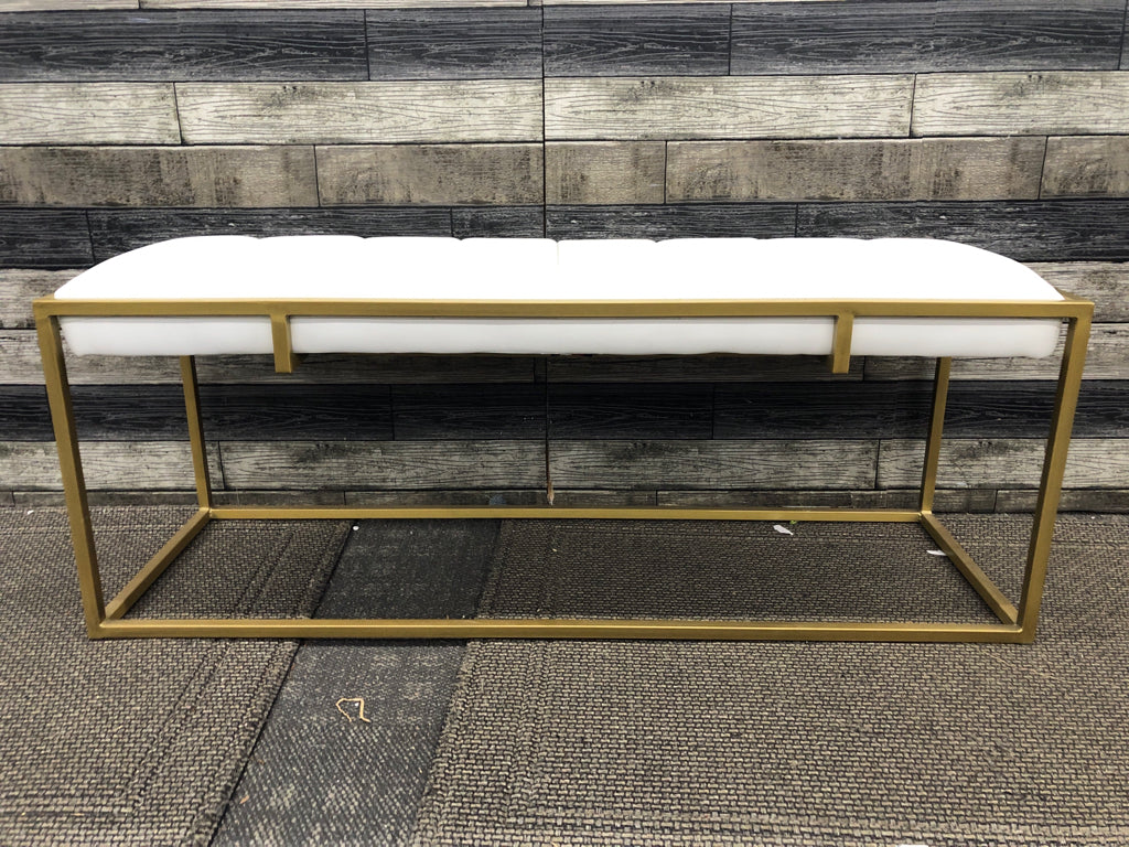 UPHOLSTERED WHITE FAUX-LEATHER BENCH W/GOLD FRAME.