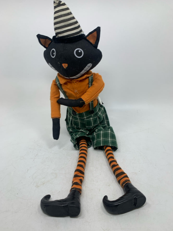 PLUSH BLACK CAT IN OVERALLS SHELF SITTER.