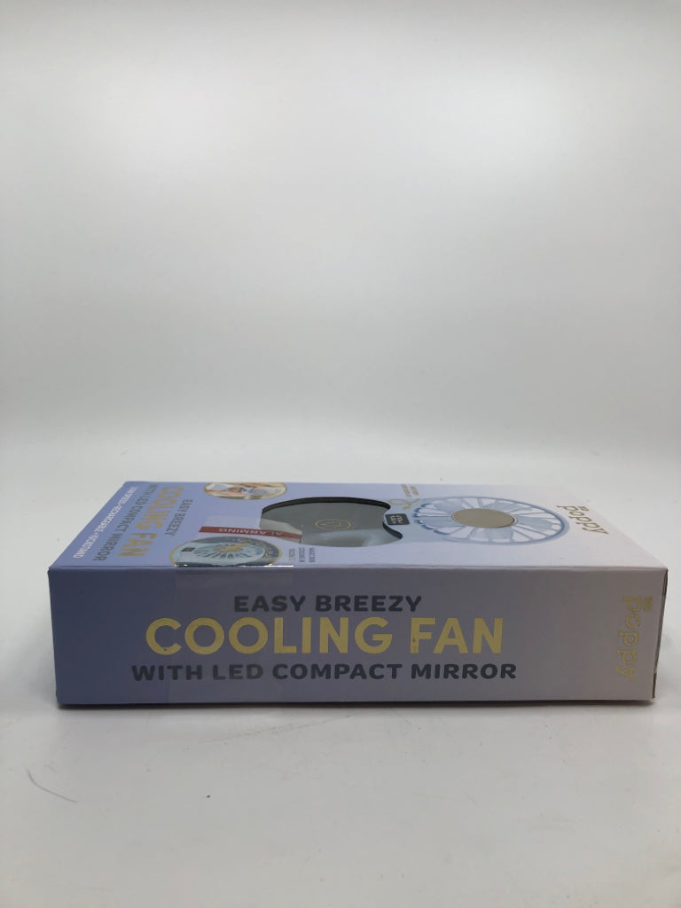 NIB EASY BREEZY COOLING FAN.