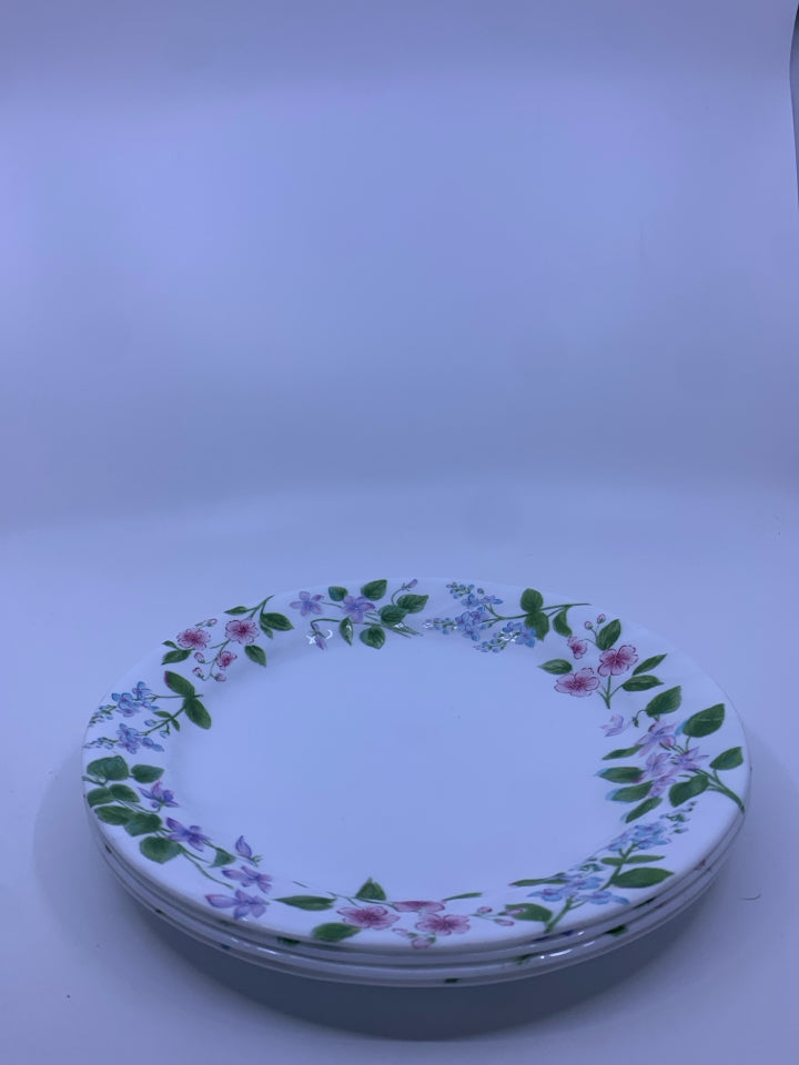 4 CORELLE DINNER PLATES W/ PINK,BLUE,PURPLE FLOWERS.