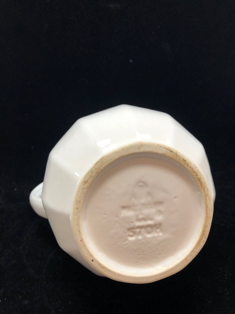 WHITE CERAMIC PITCHER.