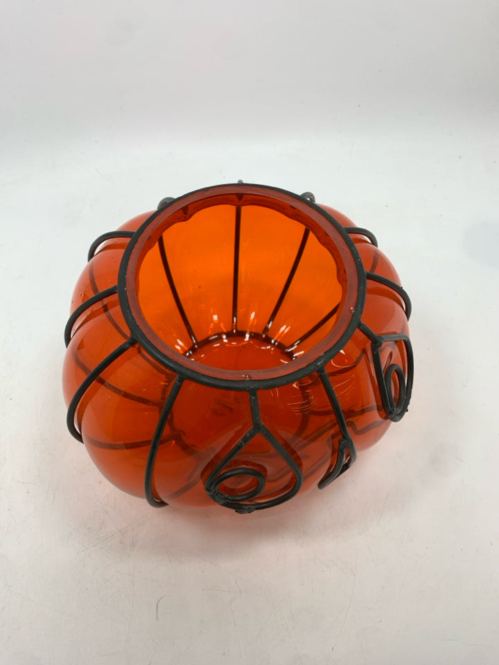 ORANGE GLASS IN BLACK PUMPKIN FACE CANDLE HOLDER.
