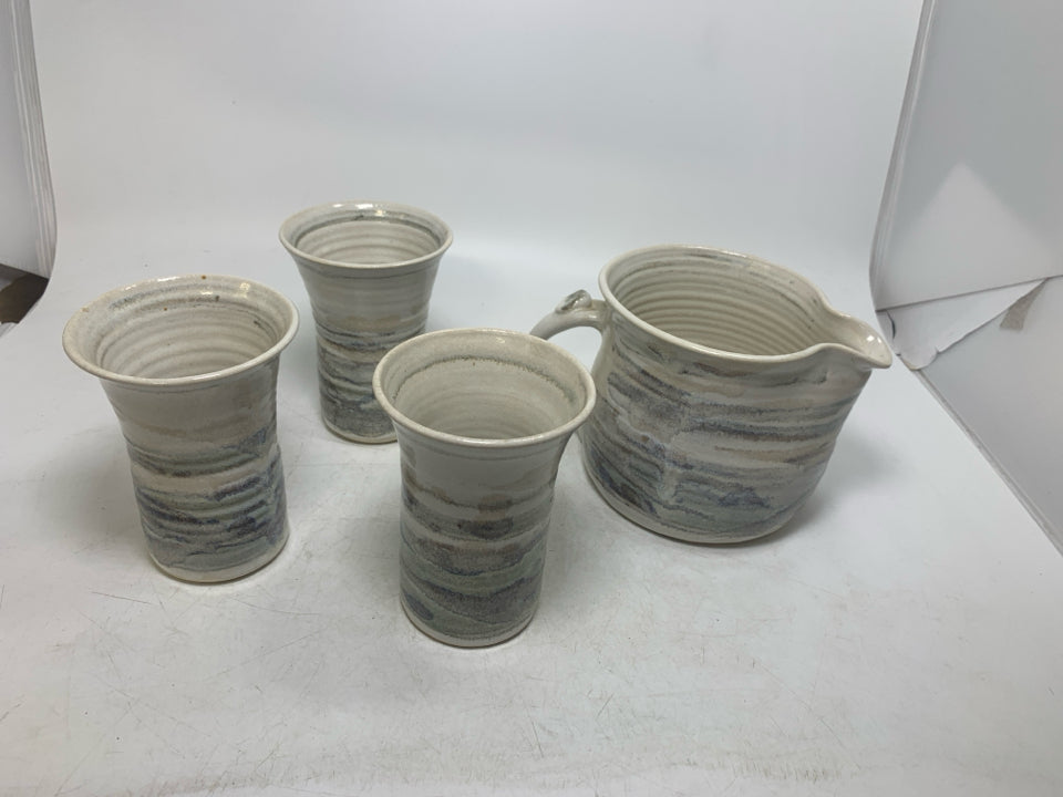 4 PC MULTI COLORED STRIPED POTTERY CUPS W/ PITCHER.