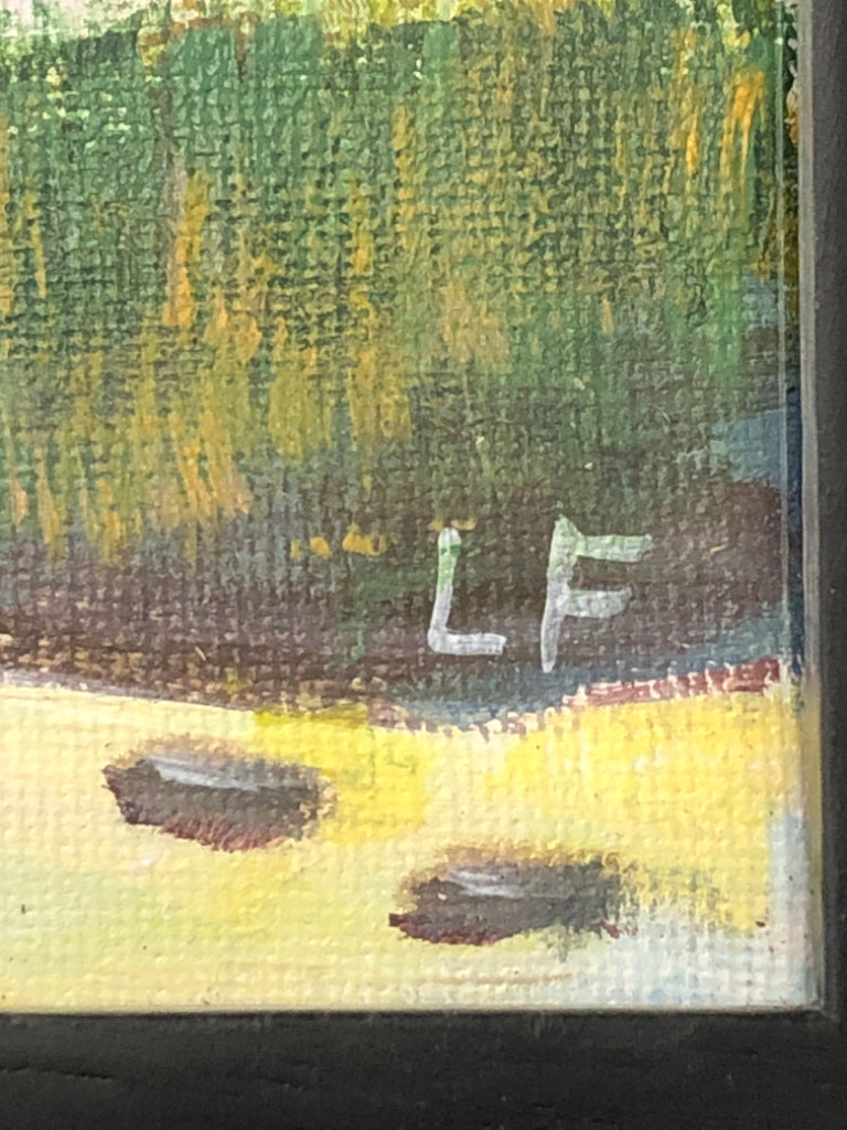MOUNTAIN LAKE PAINTING IN BLACK WOOD FRAME.