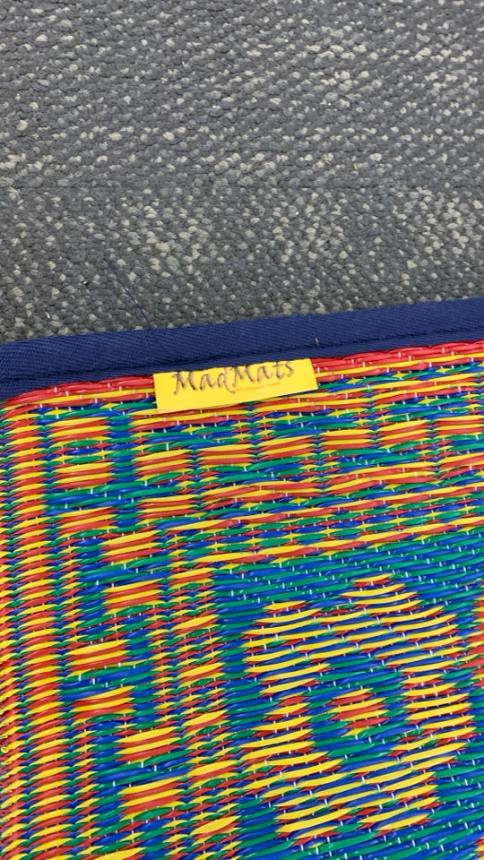 BLUE/ORANGE MAD MATS REVERSIBLE INDOOR OUTDOOR RUG.
