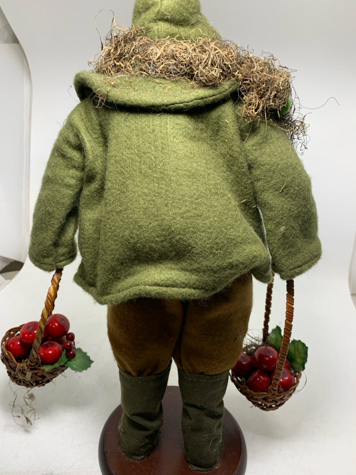 LARGE SANTA W/ GREEN SHIRT LARGE WREATH AROUND NECK HOLDING BASKET OF APPLES.