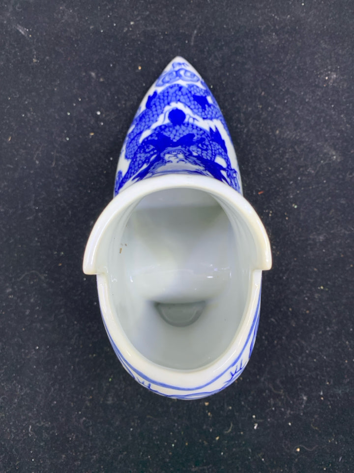 BLUE AND WHITE SHOE PLANTER.