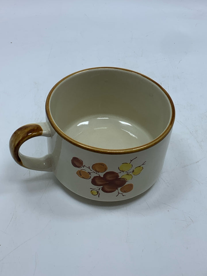 VTG TAN FLORAL MUG.