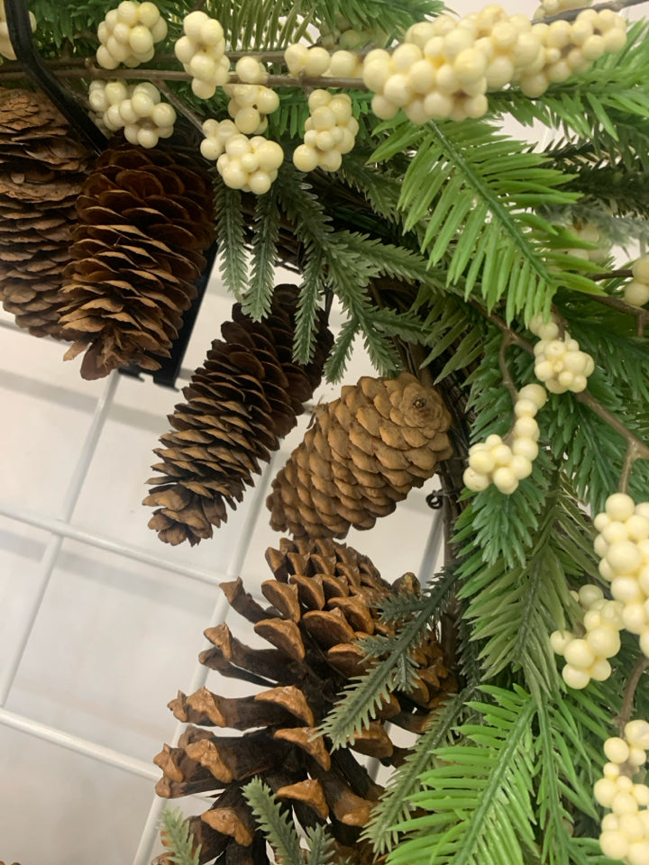 FAUX WREATH W PINECONES AND WHITE PIP BERRIES.