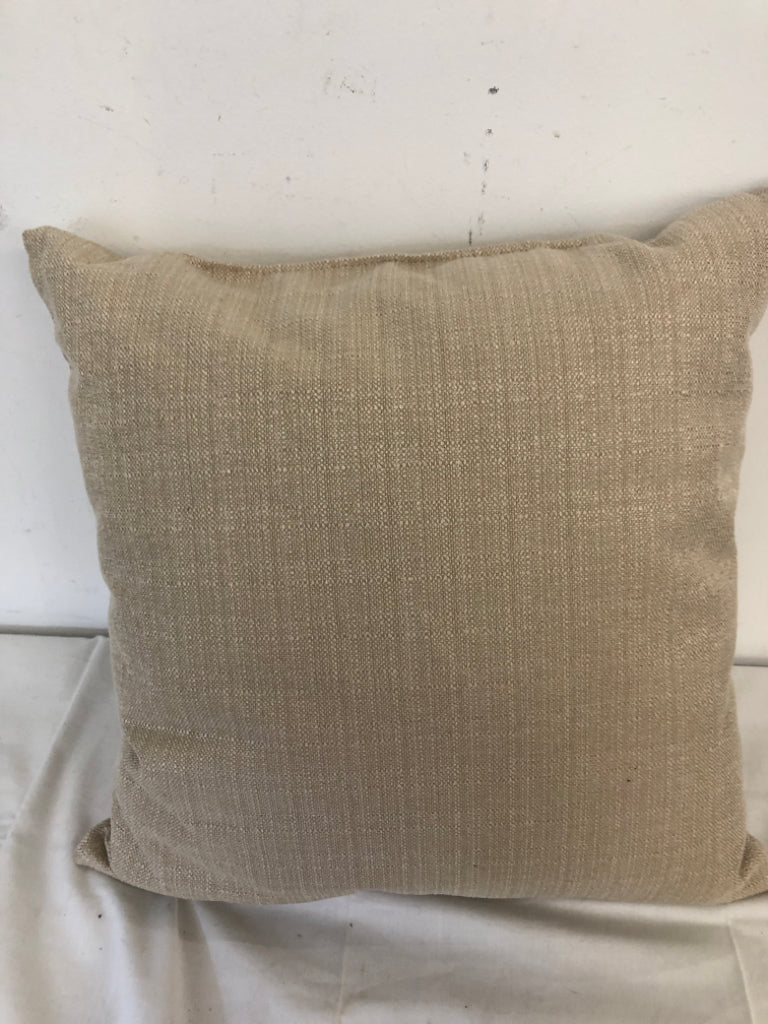 TAN PILLOW W BROWN BUTTON.