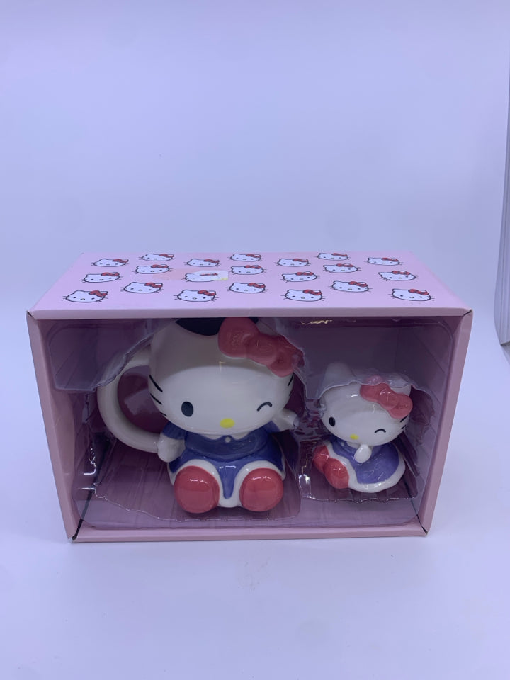 NIB HELLO KITTY MUG AND FIGURINE SET.