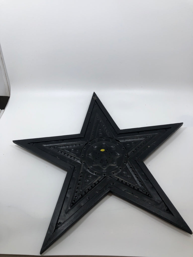 METAL PUNCHED STAR WALL DECOR.
