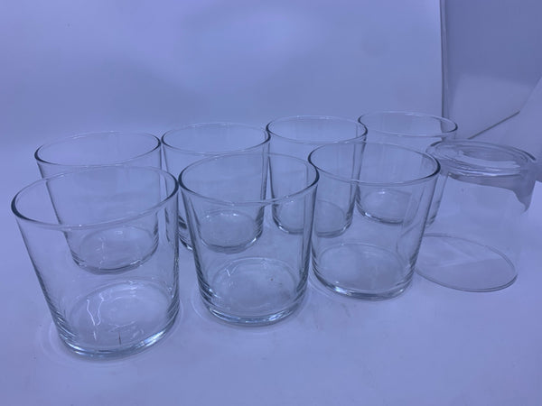 8 CLEAR JUICE GLASSES.