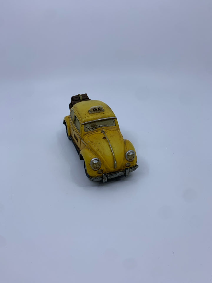 HEAVY DECORATIVE BEETLE TAXI.