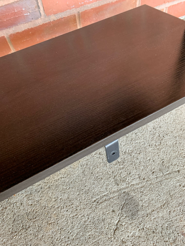 DARK FRAMED LADDER-STYLE WALL-MOUNT BOOKSHELF.