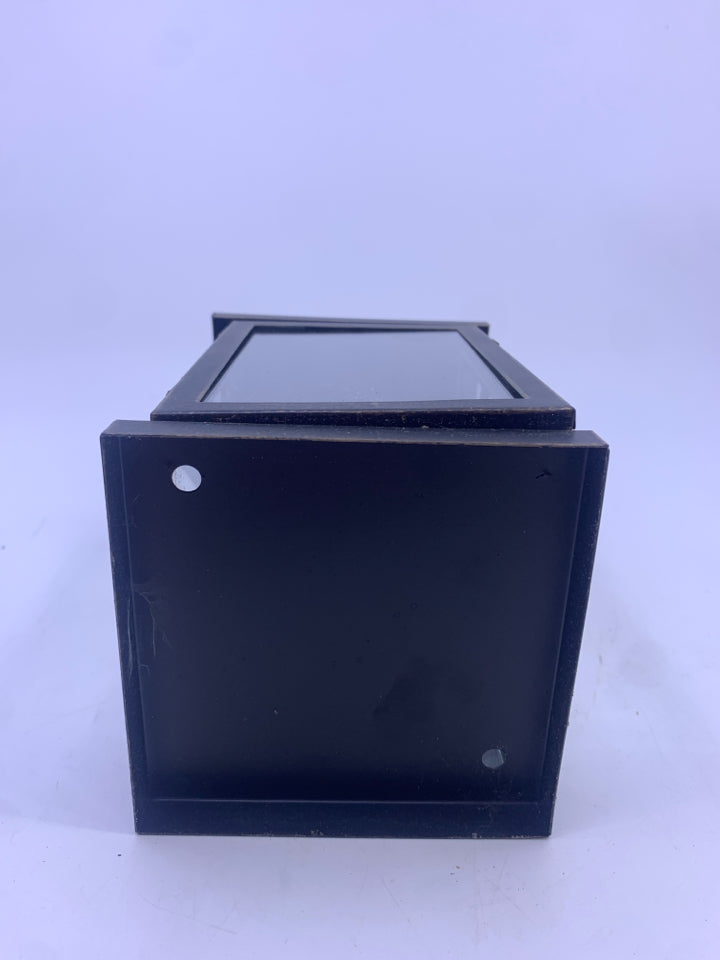 BLACK DISTRESSED LANTERN WITH ELECTRIC WHITE CANDLE.
