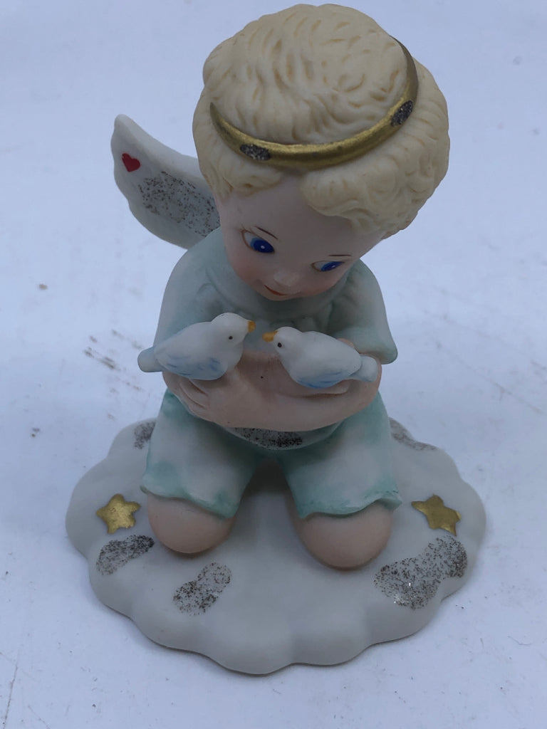 CHERUB HOLDING BIRDS.