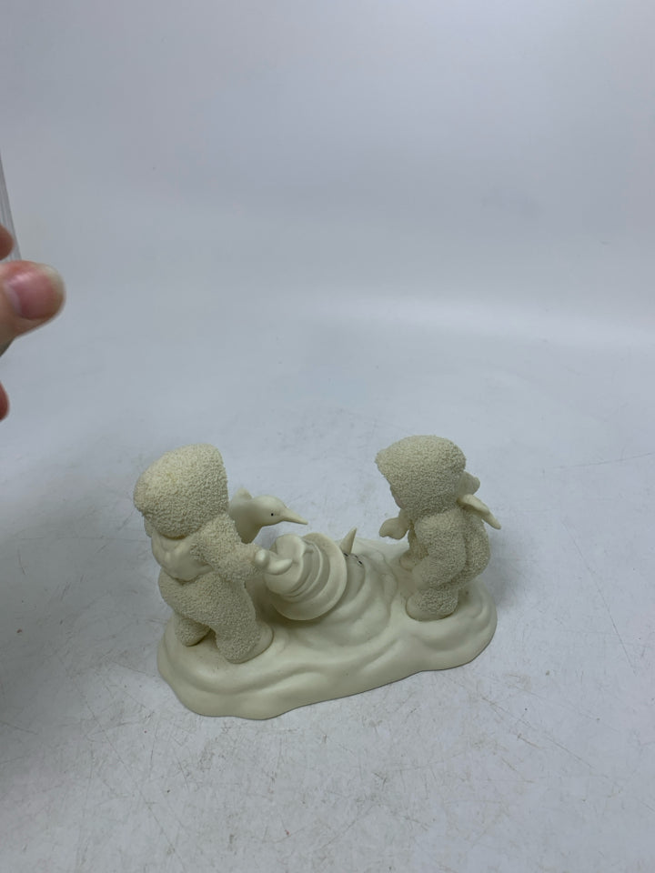 2 BABIES LOOKING AT MELTED SNOWMAN SNOWBABIES.