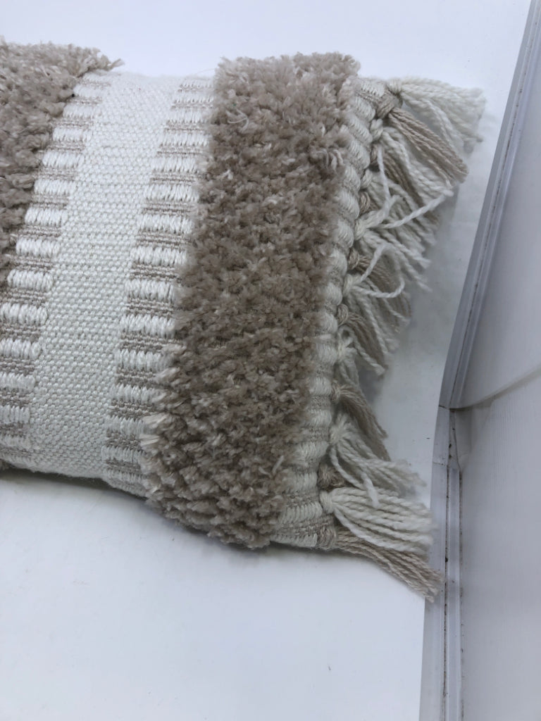 RECTANGLE TAN AND CREAM PILLOW W/FRINGE.