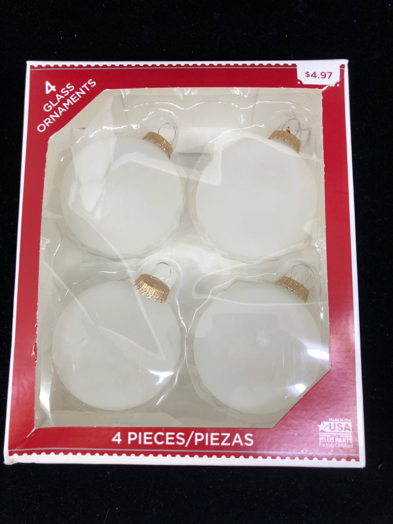 4 NIB GLASS ORNAMENTS.