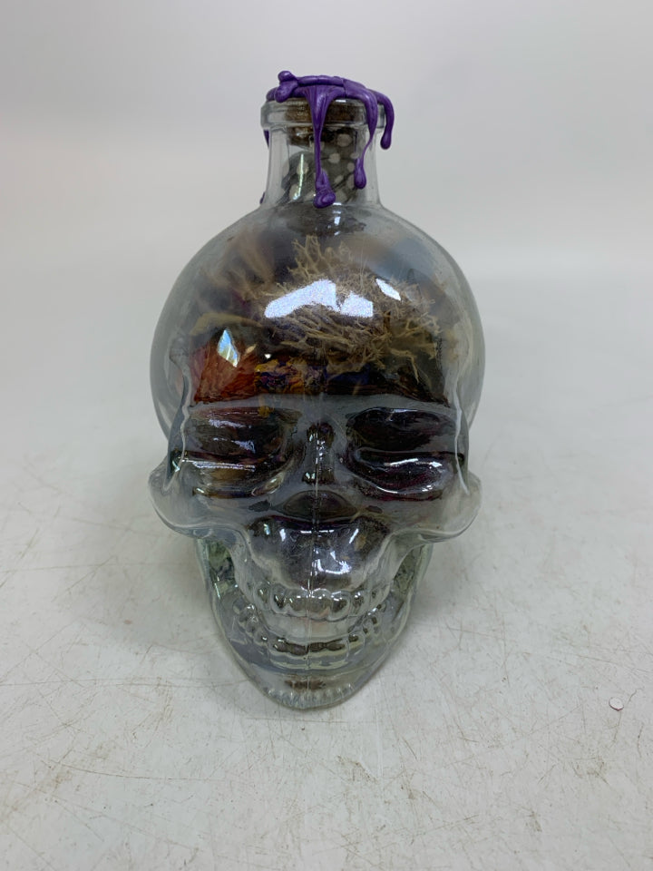 IRIDESCENT GLASS SKULL W/ FILLER.