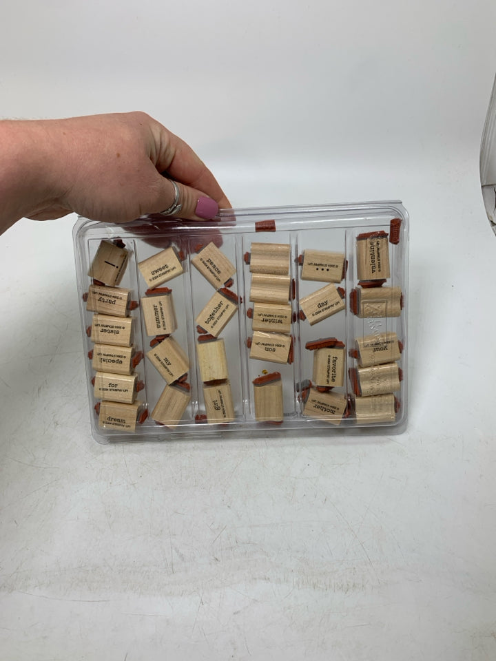 STAMPS IN CASE.