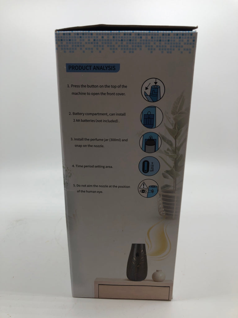 NIB AUTOMATIC AIR FRESHENER DISPENSER TIME CONTROLED.