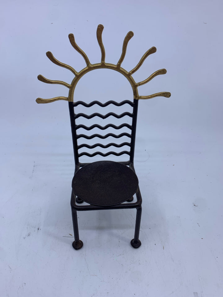 METAL CHAIR PILLAR CANDLE HOLDER W/ SUN TOP.