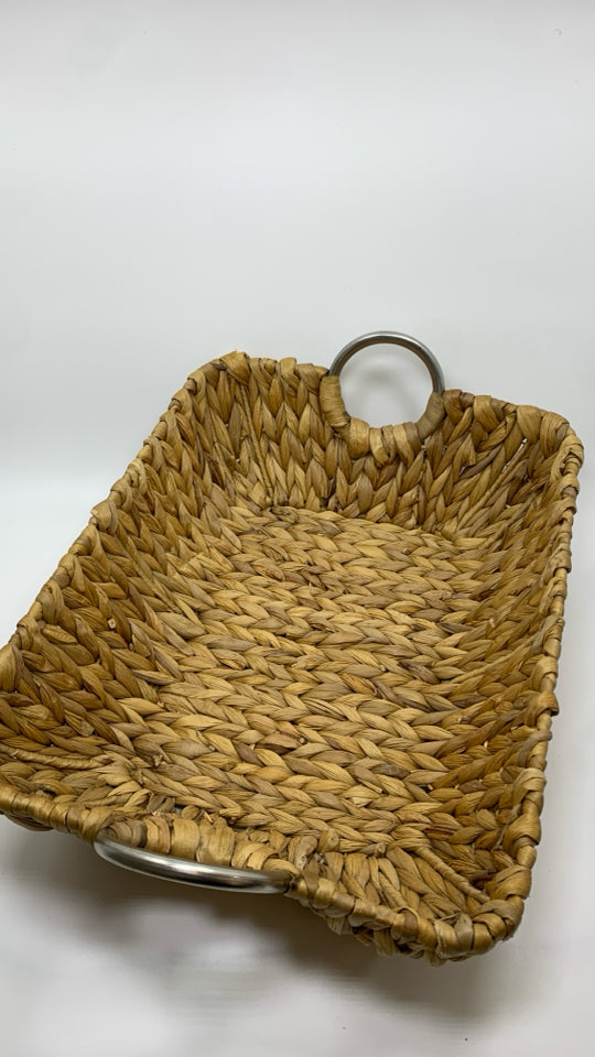 LONG WOVEN BASKET W/METAL HANDLES.
