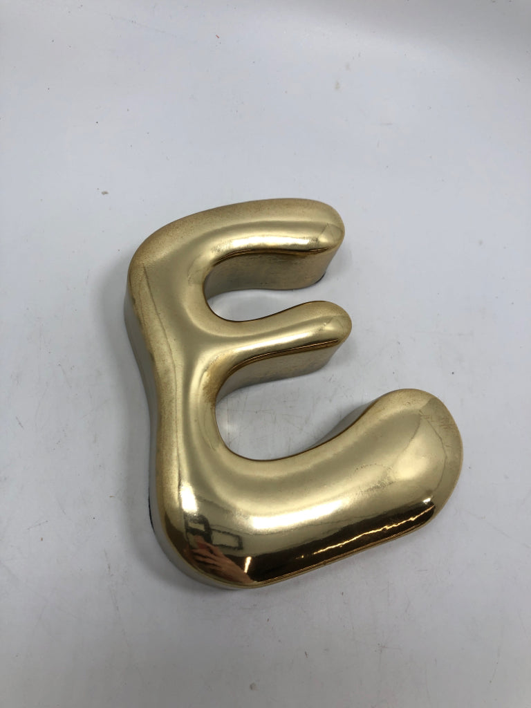 GOLDEN "E".