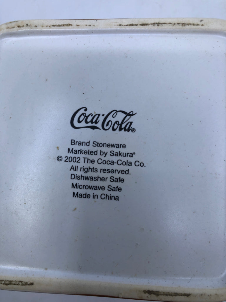 NIB GREEN SANTA COCA COLA STONEWARE CANISTER WITH LID.