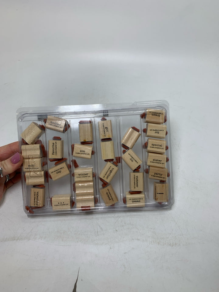 STAMPS IN CASE.