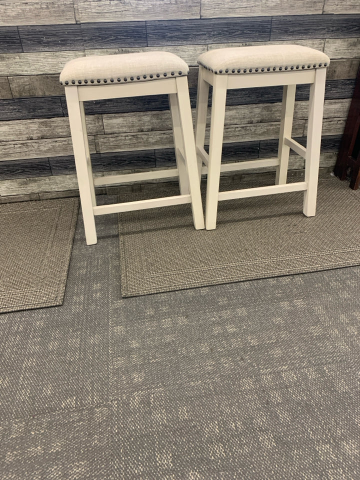 2 CREAM W GREY CUSHION STOOLS.