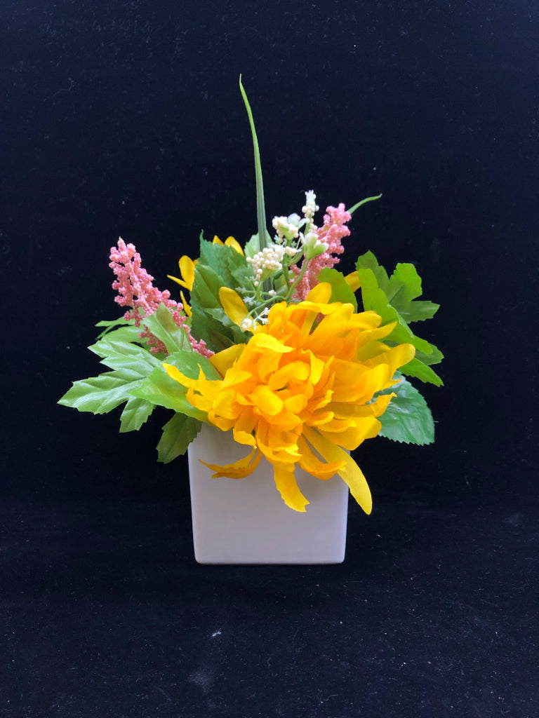 FAUX YELLOW FLORAL IN WHITE VASE.
