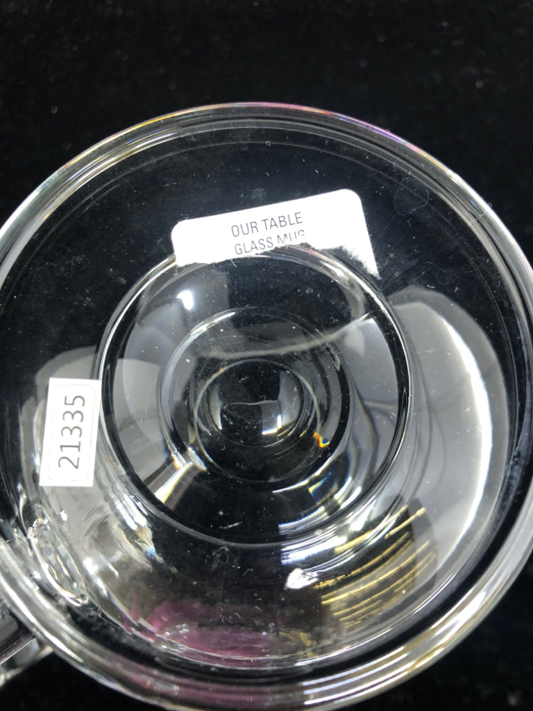 4 FOOTED GLASS MUGS.